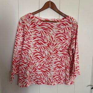 Rafaella orange (peach) and White Leaf Print top.
Tags removed, but never worn